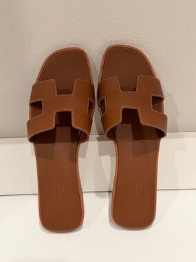Hermes Oran Sandals in Gold Color